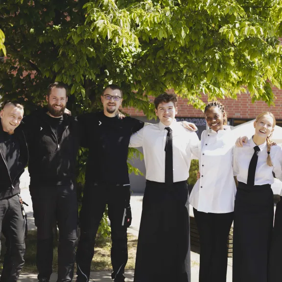 Teamfoto nach erfolgreichem Auftrag