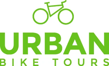 Logo mit grünem Fahrrad-Symbol und dem Text "Urban Bike Tours" in Grün.